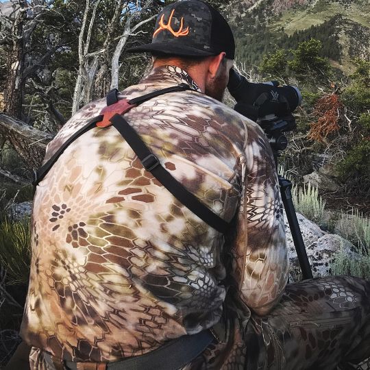 Cody looks at the trophy buck later shot by his hunting buddy. They spent most of their time at around 10,000 feet.